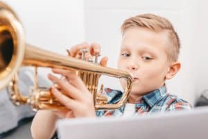 Kid Playing Trumpet